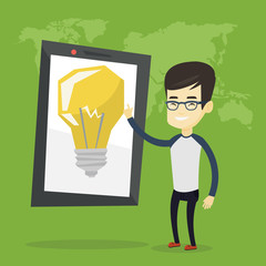 Man pointing at big tablet computer.