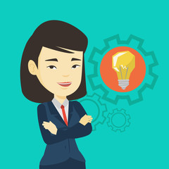 Woman with business idea bulb in gear.