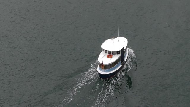 Small ship moving water surface top view