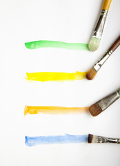 Paint line four orange yellow green blue Brushes water color on  paper