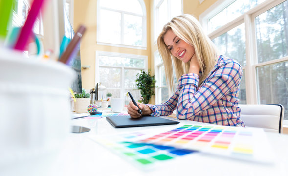 Graphic designer using her graphic tablet
