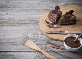 Chocolate cake on old wooden table