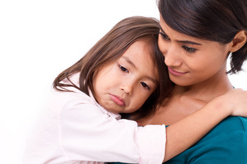 mother comforting, caring her daughter in unhappy, sad, negative emotion