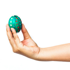 hand holding a easter egg on white
