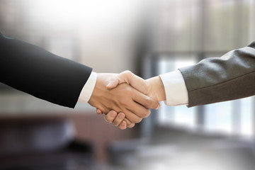 M&A (MERGERS AND ACQUISITIONS) , Businessman handshake working at office M&A