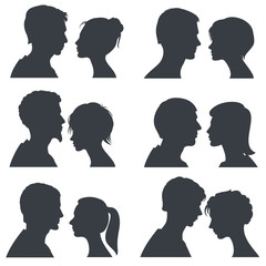 Couple faces, young boy and girl head vector silhouettes isolated on white