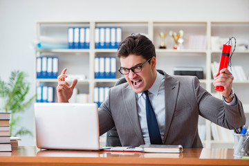 Angry aggressive businessman in the office