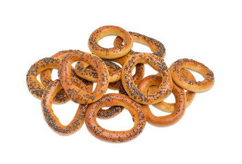 Fototapeta premium Pile of small crunchy bagels topped with poppy seeds