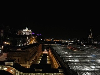 EDINBURGH, GREAT BRITAIN - MARCH 27, 2017 : night view of Edinburgh Waverley train station and Edinburgh historical buildings