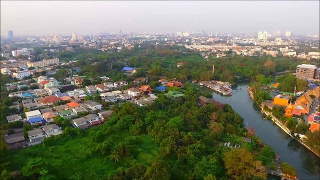 Aerial view of the green spaces and canals of Bangkok' suburbs,Thailand