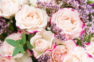 Floral background from fresh flowers closeup