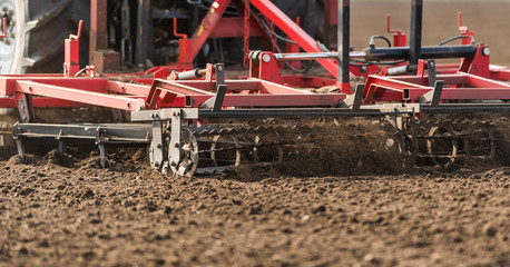 Tractor preparing land for sowing