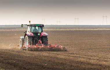 Tractor preparing land for sowing