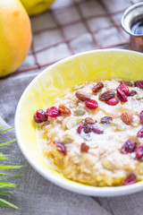 Oatmeal with Cranberry, Almonds and Honey for Healthy Vegan Breakfast