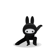 Squatting cute bunny ninja isolated on white background © Elokua