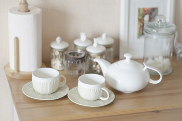 Fototapeta na wymiar Set of new white dishes on wooden table, indoors
