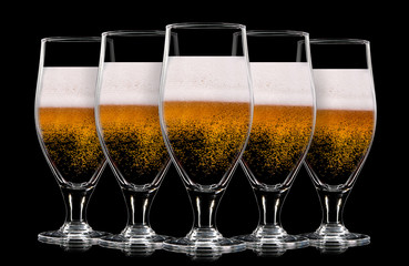 Silhouette of beer glasses with bubbles on a black background