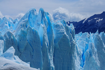 Fototapeta na wymiar Perito Moreno Glacier, the most beautiful glaciers in the world. Located in Patagonia, Argentina. Travel Destination. Global Warming.