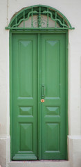 Fototapeta na wymiar Green wooden door