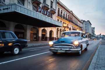 Old car on street of Havana at sunrise, Cuba