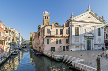 Fototapeta na wymiar Beautiful view of the Church of Santa Fosca in Campo Santa Fosca and the homonymous canal, Cannaregio, Venice, Italy