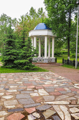 a stone summerhouse in the Park