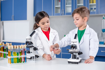 Kids in chemical laboratory