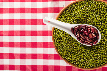 mix of beans on wooden table