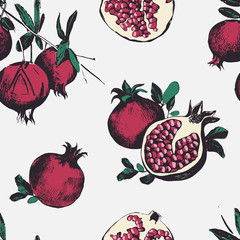 Seamless pattern with pomegranates. Fruits on white background.