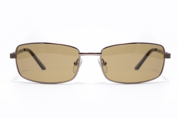 Men's sunglasses with brown glasses in metal frame isolated on white