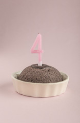 birthday cake with candle age four