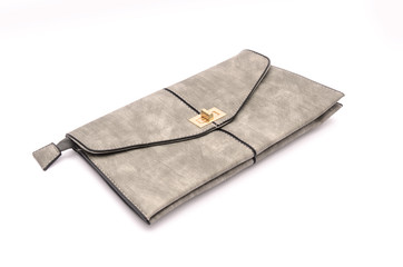 Gray leather clutch isolated on white
