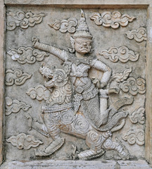 Sculpture, stone carving on the wall in the Temple of Literature Thailand, Black and white tone