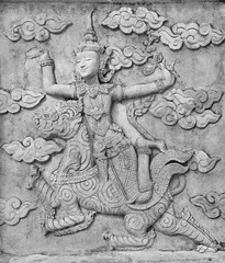 Sculpture, stone carving on the wall in the Temple of Literature Thailand, Black and white tone