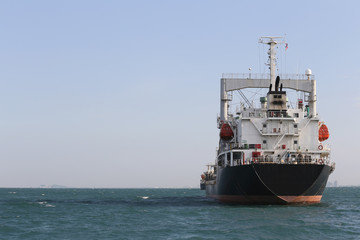 Marine cargo ship in sea.