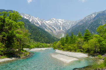 Hotaka mountain range and azusa river in spring at kamikochi national park nagano japan