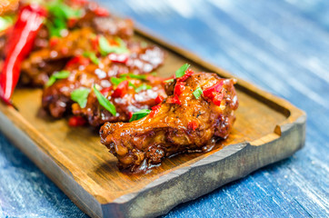 Hot meat dish - Fried chicken legs with curry sauce and red pepper
