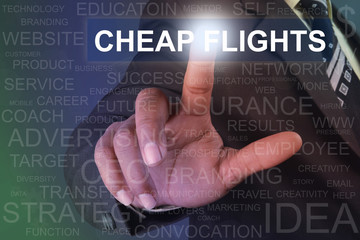 Businessman touching cheap flights button on virtual screen