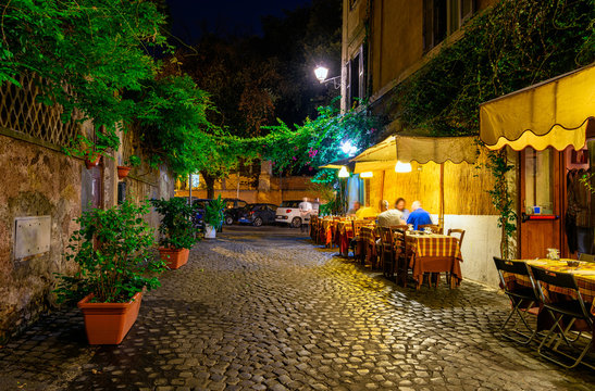 Night view of old street in Trastevere in Rome, Italy