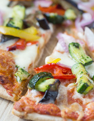 macro shot of pizza with vegetables