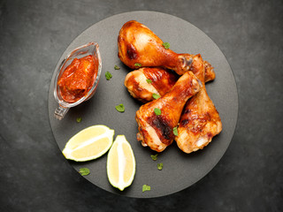 Fried grilled chicken legs  and pickles hot sauce with mango