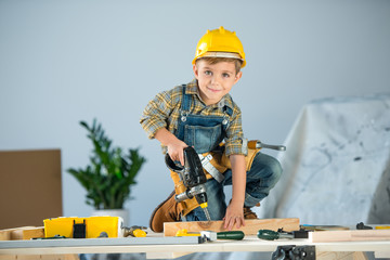 Little boy with tools