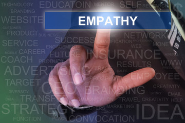 Businessman touching empathy button on virtual screen