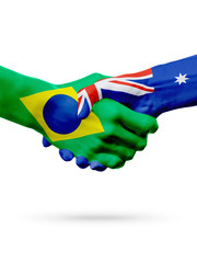 Flags Brazil Australia countries, partnership friendship handshake concept.
