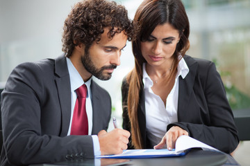 Business people working on a document