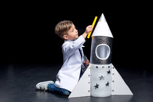 Little boy with rocket
