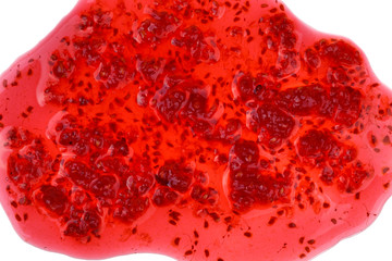 Macro shot of spilled raspberry jam