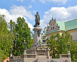 Fototapeta na wymiar Monument to Adam Mickiewicz in the square. Warsaw, Poland