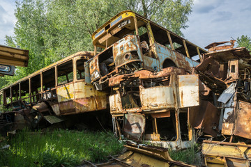Fototapeta na wymiar Old abandoned bus in the Chernobyl Exclusion Zone
