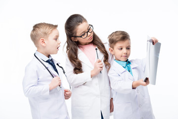 Fototapeta premium Kids playing doctors